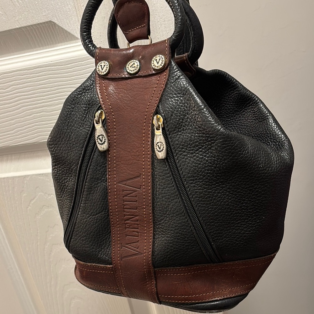 Valentina Black and Brown Leather bucket backpack/sling bag.